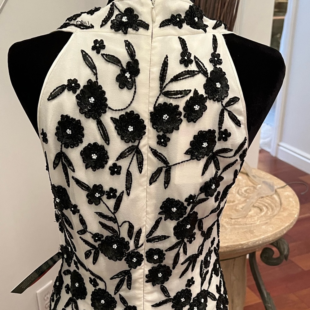 New white and black gown